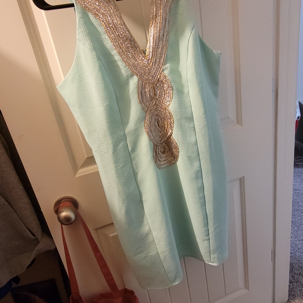 Gorgeous baby blue dress with gold and silver embellishment. Excellent condition